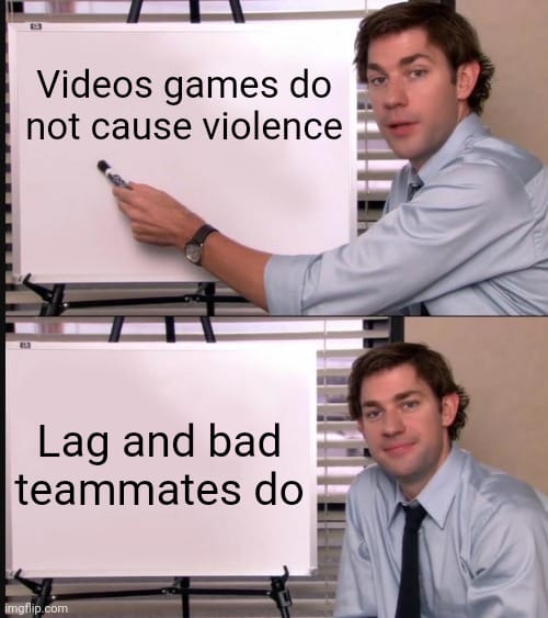 Guy pointing to board that reads: Video games do not cause violence, lag and bad teammates do